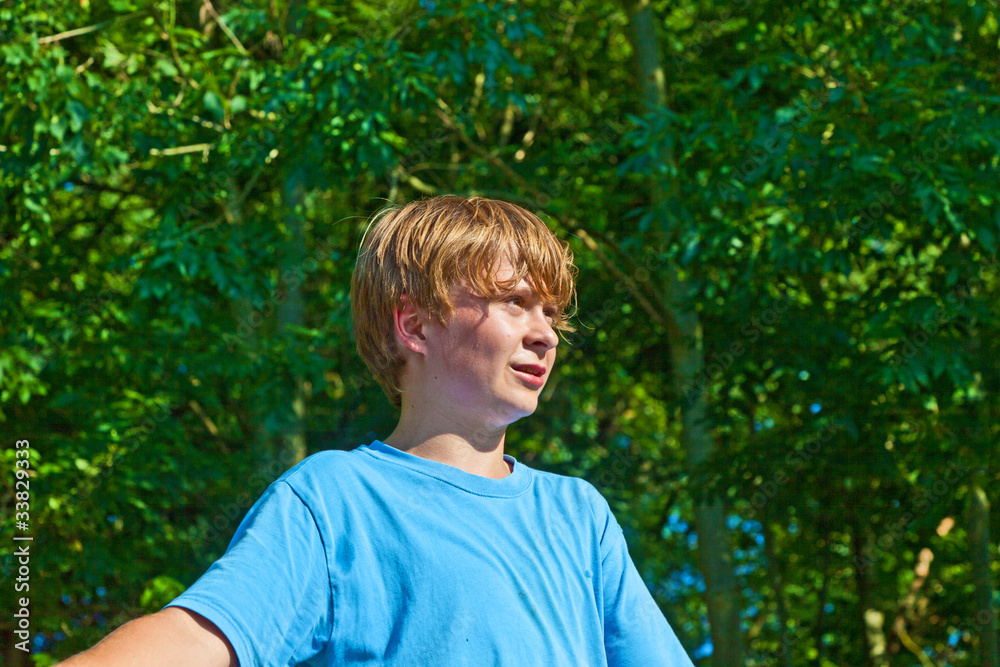 cute boy sweating after outdoor sports in nature cute boy sweating after outdoor sports in nature