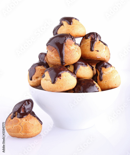 Canvastavla profiteroles sur fond blanc
