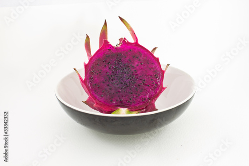 red organic dragon fruit in cup