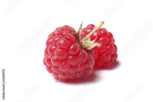 two raspberry isolated on white