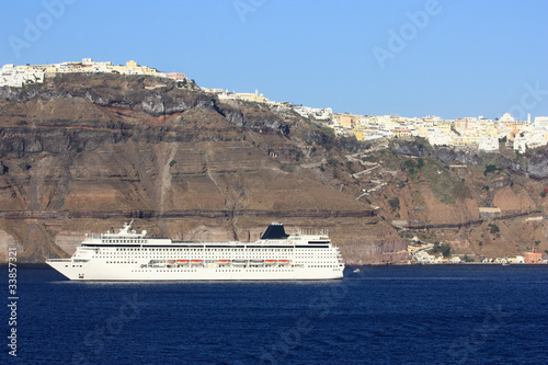 cruise ship docked in santorini island © Elena Zarubina