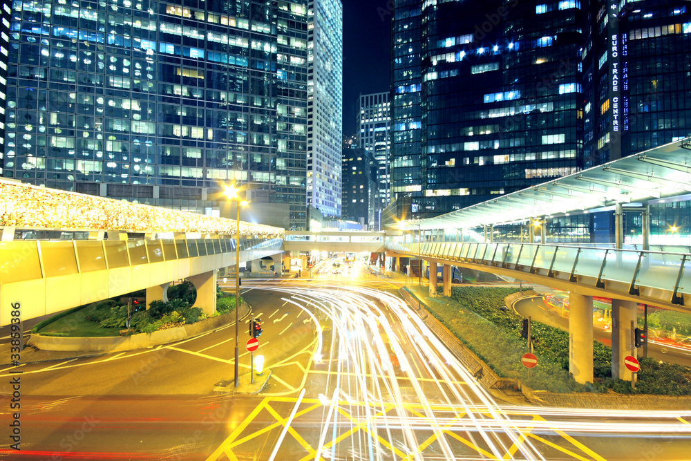 Traffic through the city (traffic seen as trails of light) Traffic through the city (traffic seen as trails of light)