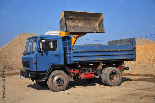 excavator loading truck