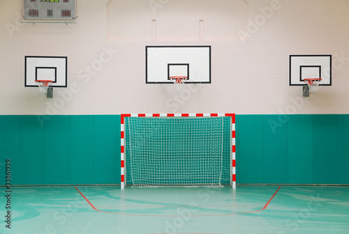School sports hall: three basketball boards and gate