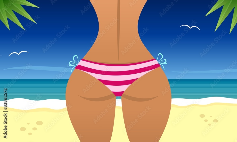 Sexy woman on the beach near a sea