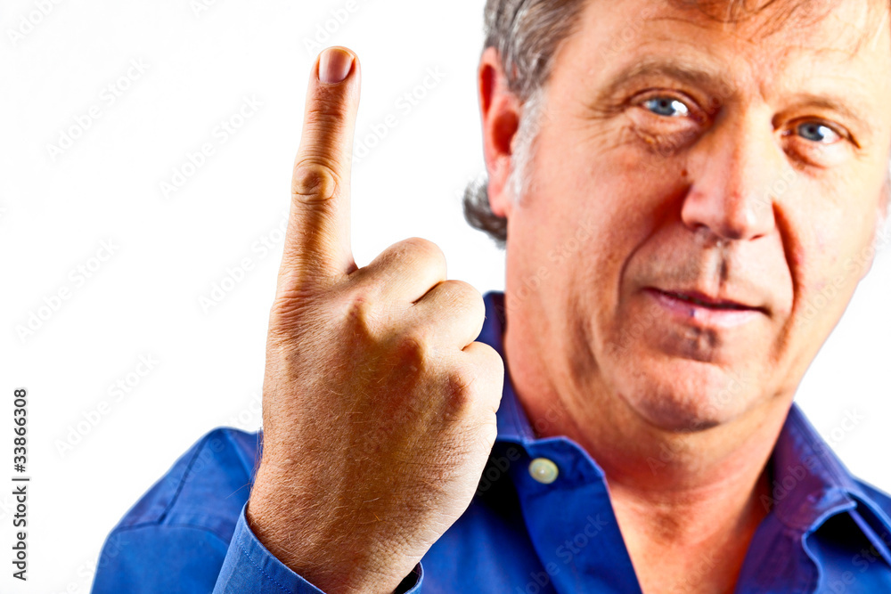 portrait of man showing his finger to warn portrait of man showing his finger to warn