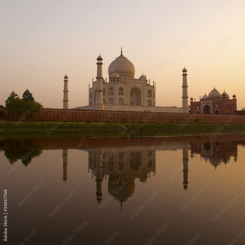 Taj Mahal from north bank of Yamuna river at sunset.