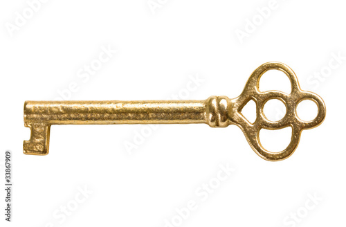 Antique gold key isolated on white background
