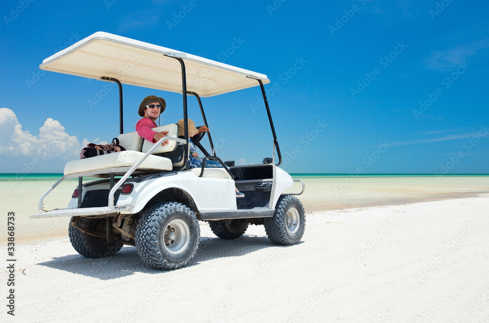 Golf cart at tropical beach Stock 写真 | Adobe Stock