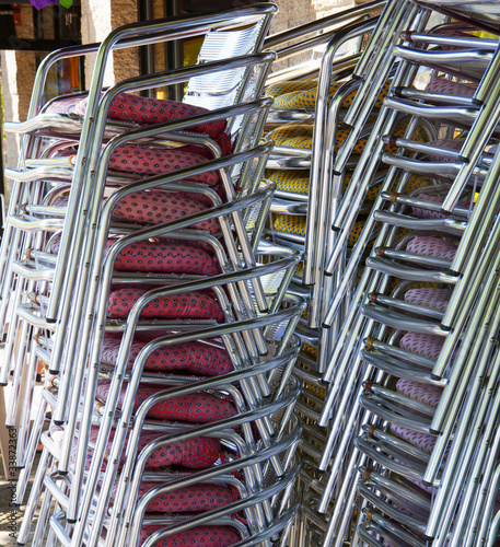 Stacked restaurant chairs © Robert Keenan