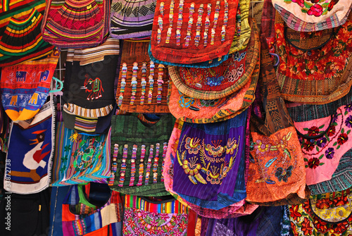Colorful handbags at street market