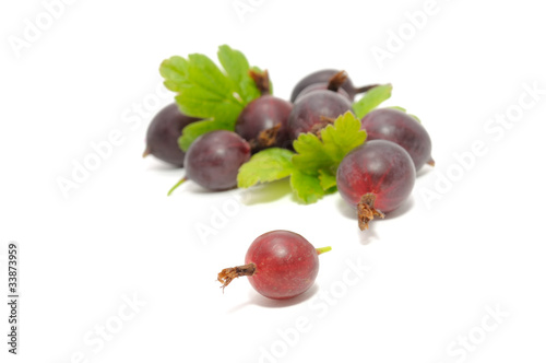 Red Gooseberries with Leaves Isolated on White Background photo
