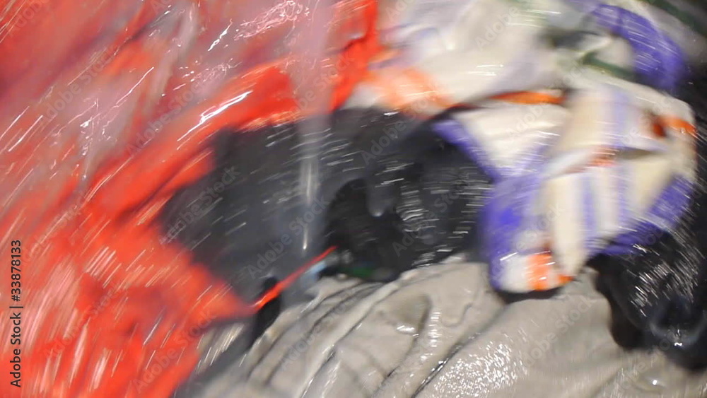 Barrel of washing machine in motion close up