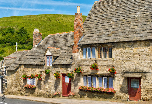 Row of limestone cottages in an English village #33880952