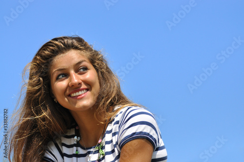 Fotografija Jeune femme au sourire malicieux