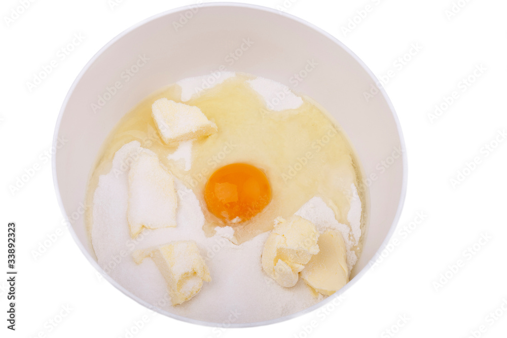 Rührschüßel mit Butter, Mehl,Zucker und einem Ei Rührschüßel mit Butter, Mehl,Zucker und einem Ei