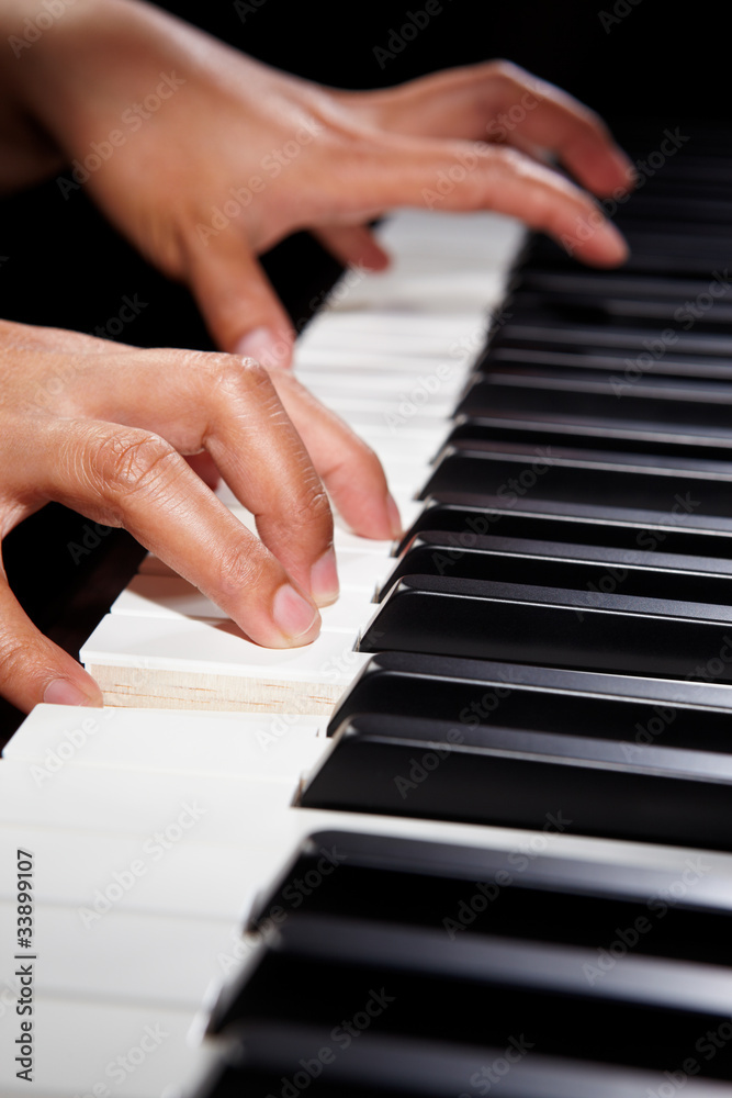 Fototapeta premium Playing piano