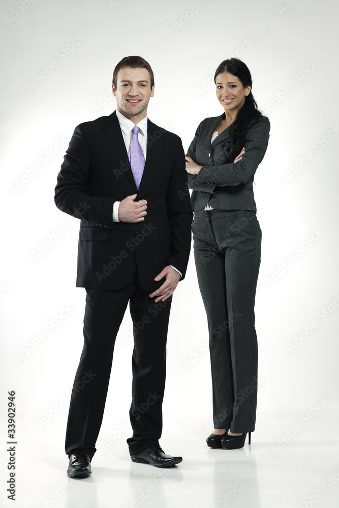 confident smiling businessman and businesswoman confident smiling businessman and businesswoman