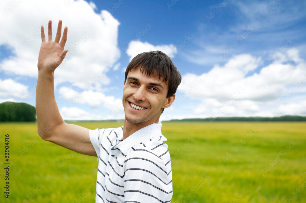 Portrait of young man taking energy from nature on vacation at c Portrait of young man taking energy from nature on vacation at c