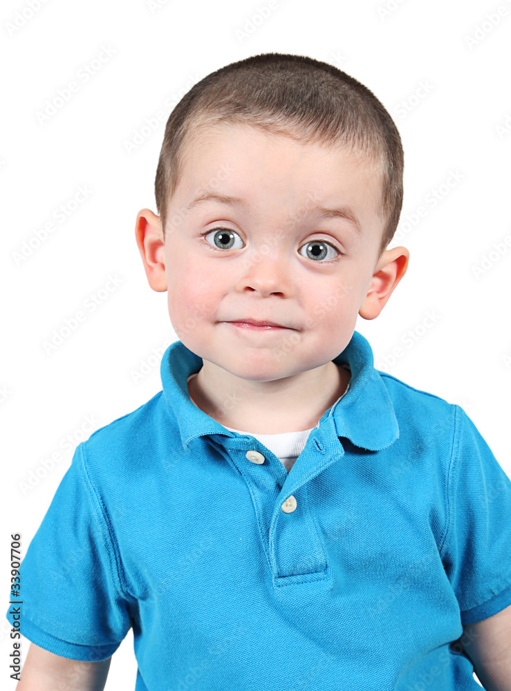 Cute little boy posing for camera on white background Cute little boy posing for camera on white background