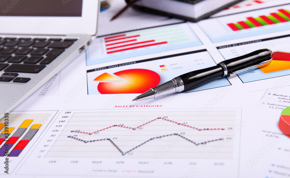 Obraz premium Graphs, charts, business table.