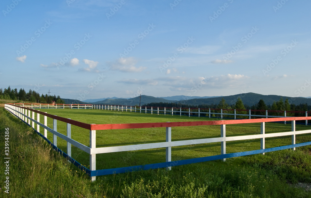 fence and farm pasture