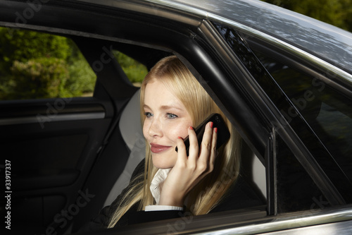 Woman on the phone in a car