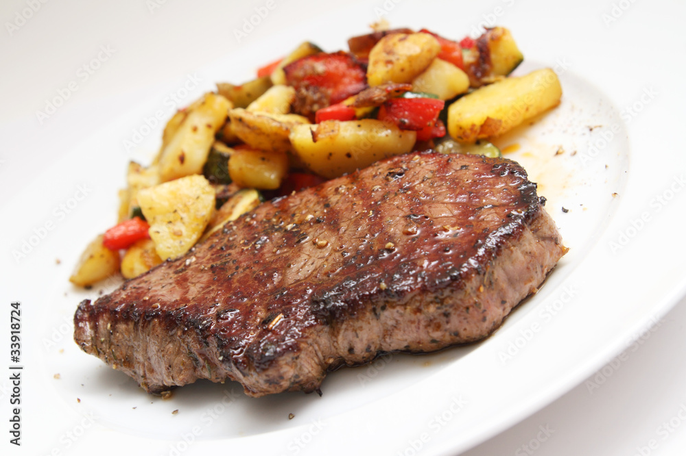 Beef steak with potaoes and mixed vegetable Beef steak with potaoes and mixed vegetable