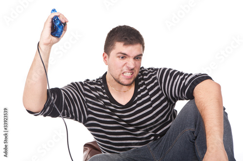 furious man with a joystick for game console