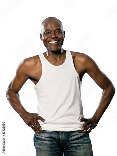 Casual mature man laughing with hands on waist