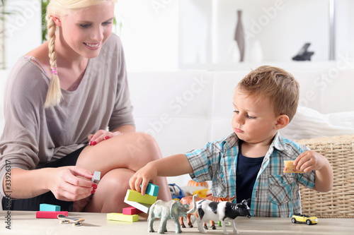 Fotografie Mother and child playing together