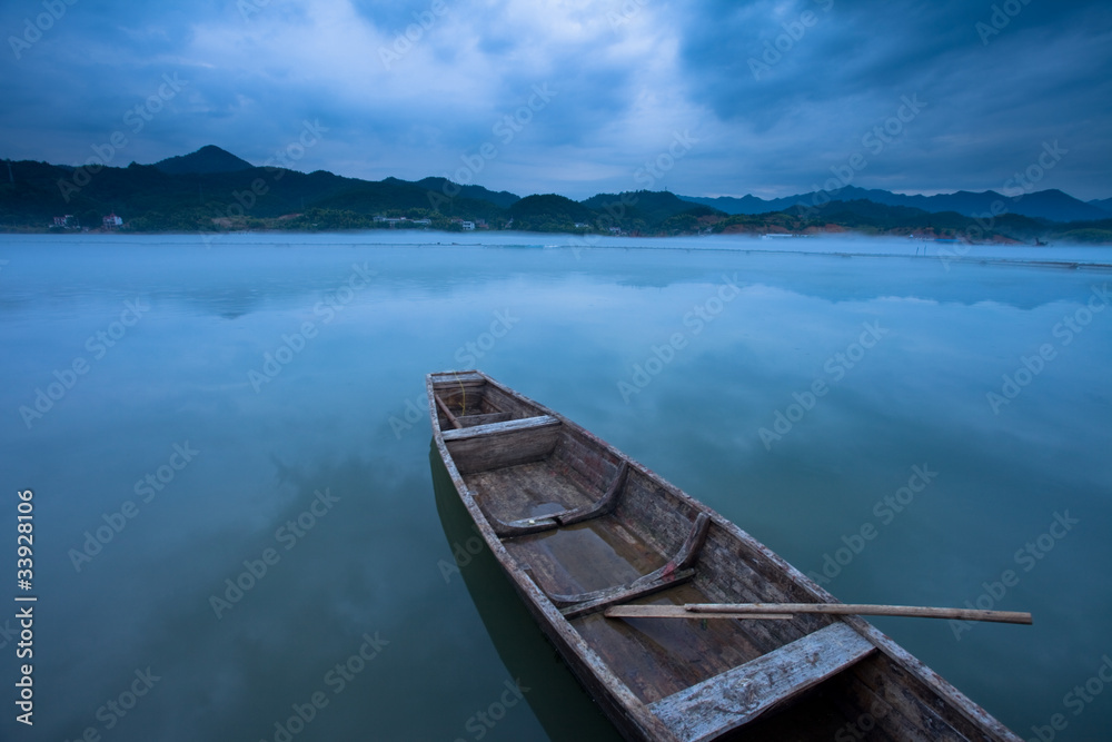 wooden boat on river