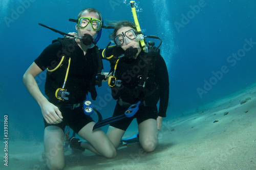 Scuba divers, man and wife
