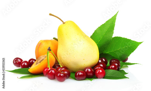 Beautiful pear  apricots and cherries isolated on white