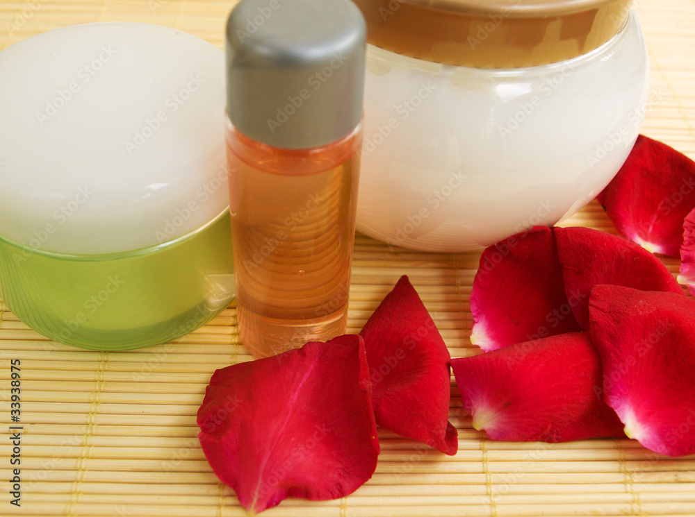 Wellness products and rose petals Wellness products and rose petals