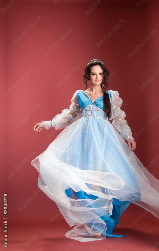 History of fashion design - woman in 16th century style dress History of fashion design - woman in 16th century style dress