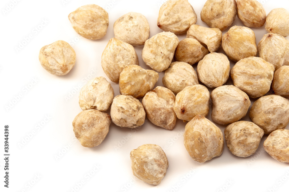 Candlenut, a spice used in asian cuisine Candlenut, a spice used in asian cuisine