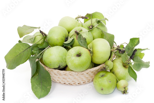 Green apples in basket