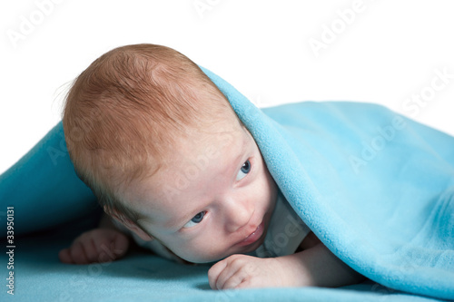 2 months old baby boy covered in blue blanket photo