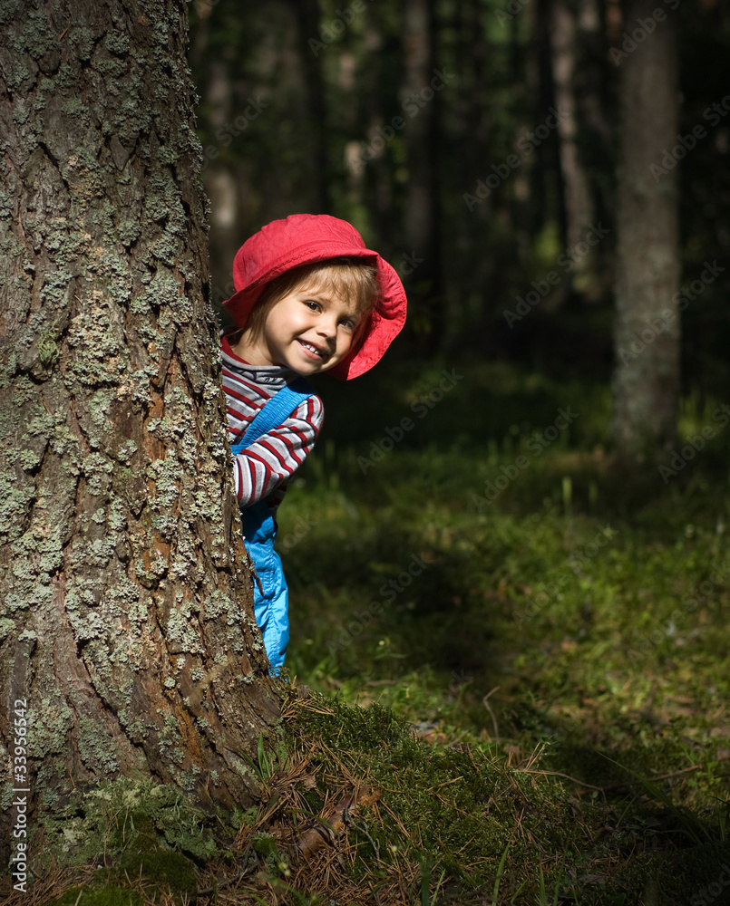 Smiling little girl in red cap Smiling little girl in red cap
