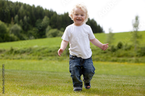 Cute Child Playing Outdoors