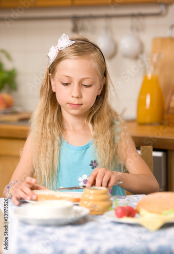 girl eating breakfast