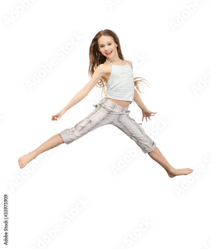 Fototapeta Naklejka Na Ścianę i Meble -  jumping teenage girl
