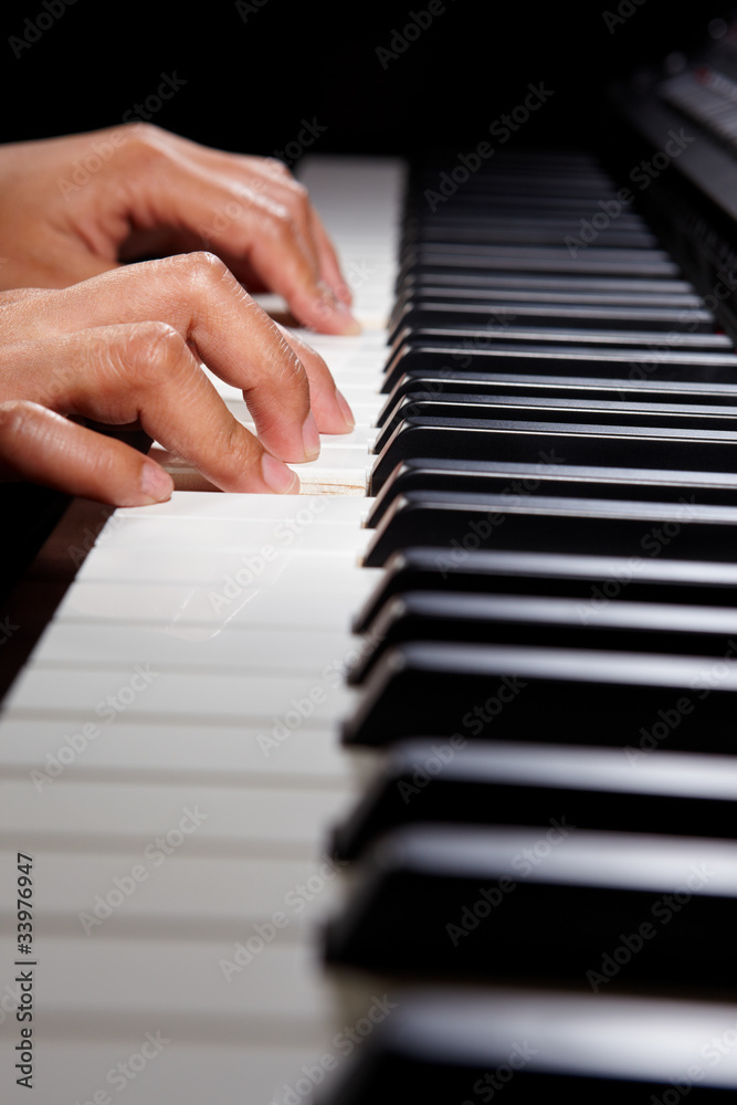 Obraz premium Playing digital hybrid piano