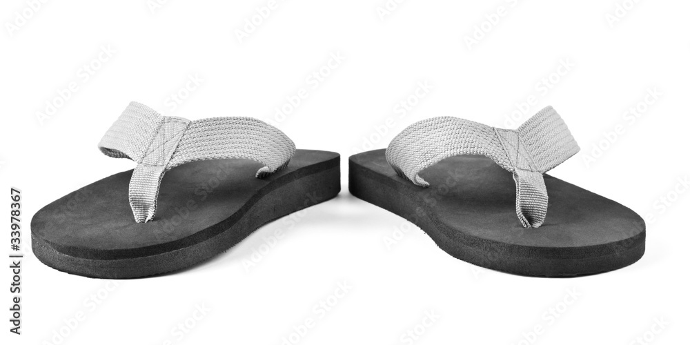 pair of black flip flops isolated on white background pair of black flip flops isolated on white background