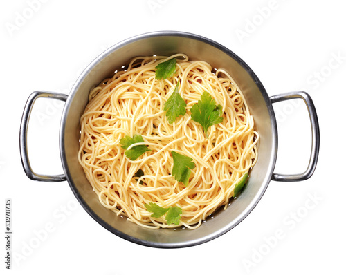 Schilderij op canvas Spaghetti in a colander