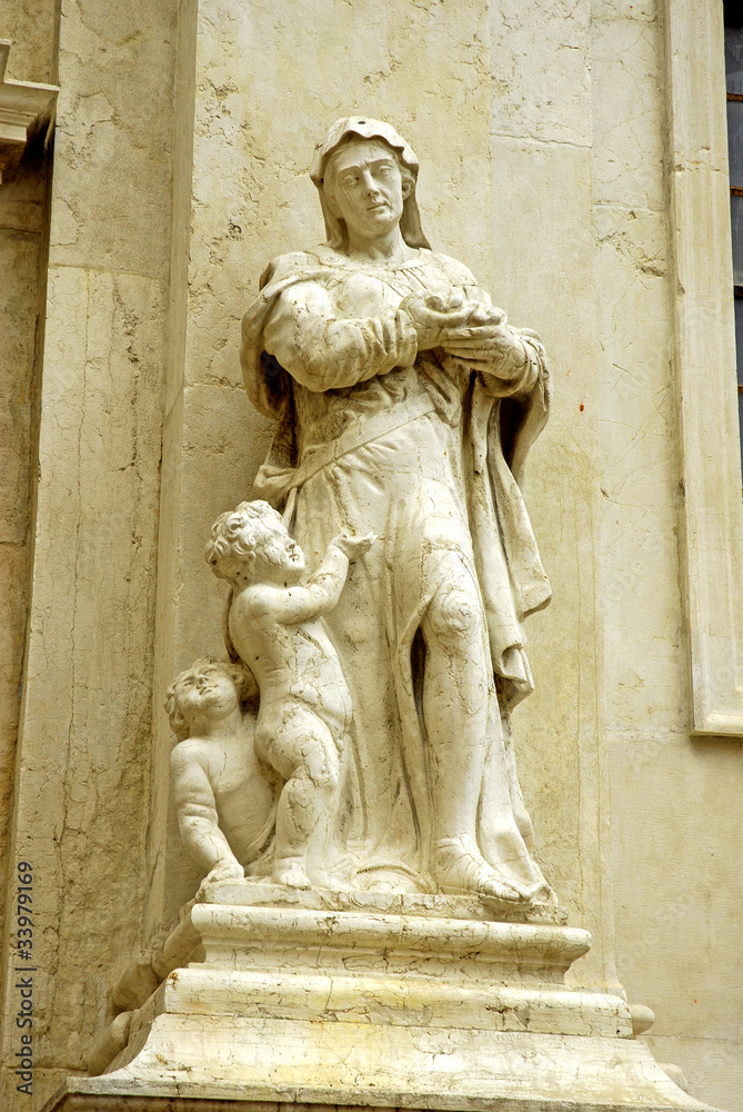 Italy, Venice Madonna statue in Misericordia area.