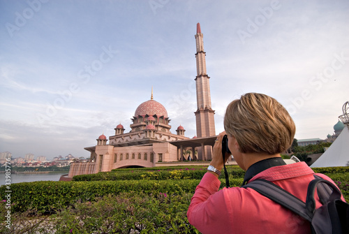Tourist visiting Putrajaya Mosque in Kuala Lumpur