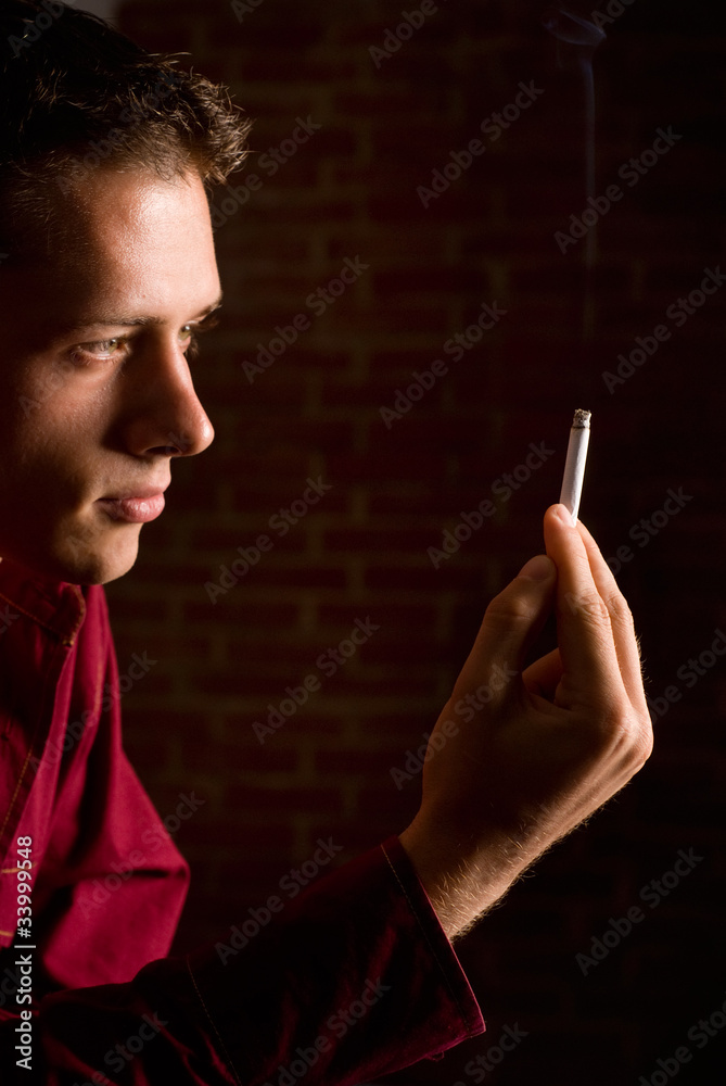 young man with cigarette young man with cigarette