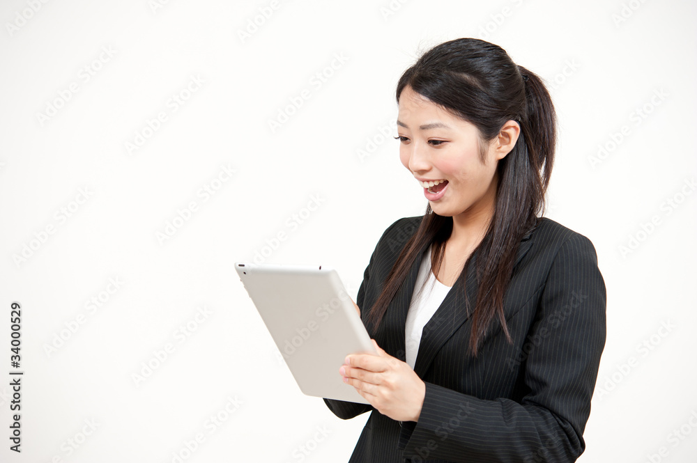 asian businesswoman using tablet computer asian businesswoman using tablet computer